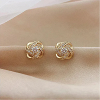 Lourdes - Boucles d'Oreilles Dorées Spirale Cristaux