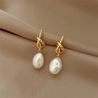 Boucles d'oreilles Baroques Dorées
